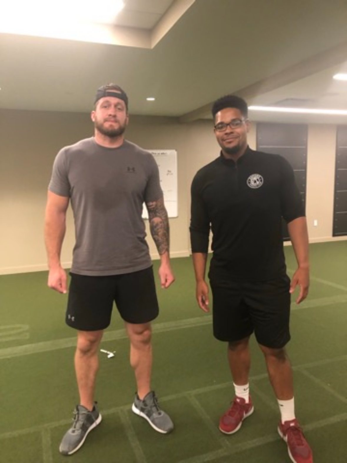 Laron Allen with a client after a training session